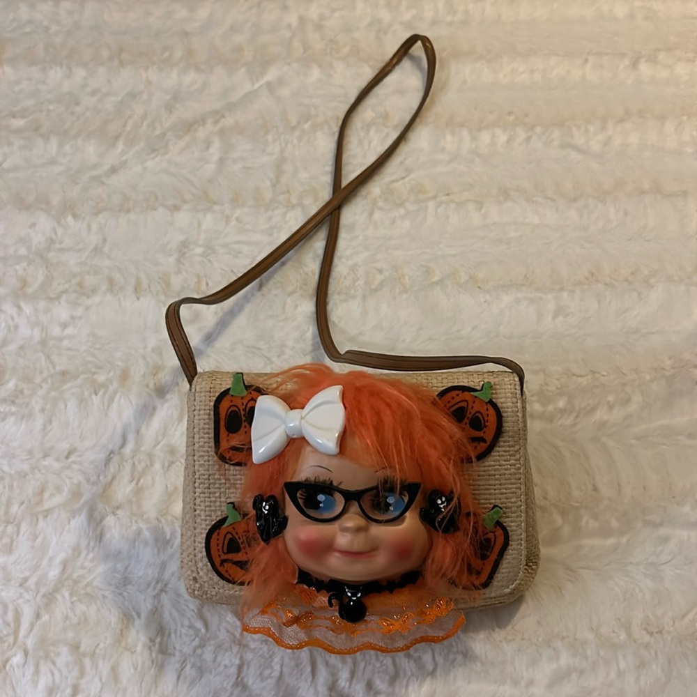 Vintage unique handmade Halloween purse with small leather shoulder strap.